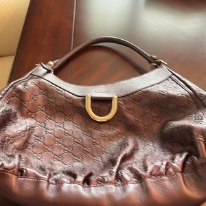 Burgundy Gucci handbag